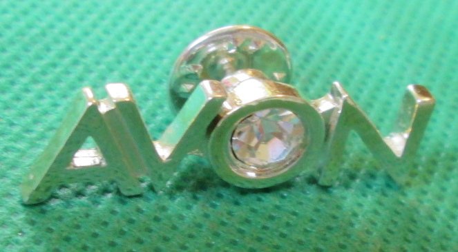 AVON logo rhinestone "O" Pinback Lapel Pin 1.5"